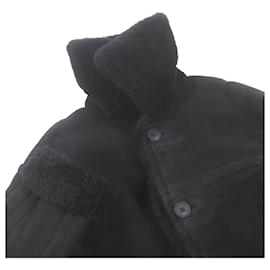 Fendi-Manteau en shearling Fendi en cuir de mouton avec bouton logo-Noir,Jaune