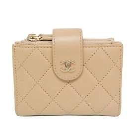 Portafoglio compatto Chanel Matelassé per carte e monete Beige