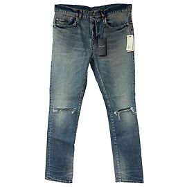 Jeans slim desbotado e rasgado em denim azul da Saint Laurent Azul Azul claro