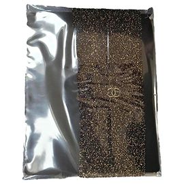 Collant Chanel in nylon nero e oro Nero D'oro