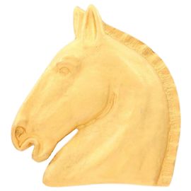 Hermès Broche en forme de cheval plaquée or Hermes Doré