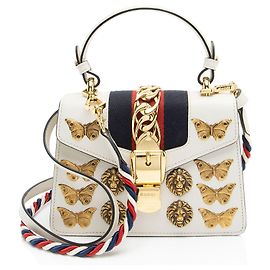 Mini bolsa Sylvie de couro com tachas de animais Gucci Branco