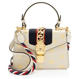 Mini borsa a mano Sylvie in pelle di vitello con ape e stella Gucci D'oro Metallico