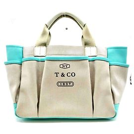 Tiffany & Co Bolsa Tote Tiffany 1837 Bege Outro