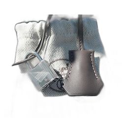 Zíper, sininho e cadeado Hermès em couro swift cinza com dustbag Cinza