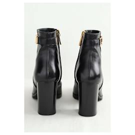Tod's-Black leather boots-Black