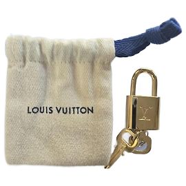 Cadenas doré Louis Vuitton N°304 Doré