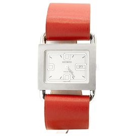 y un reloj Hermès original. Plata