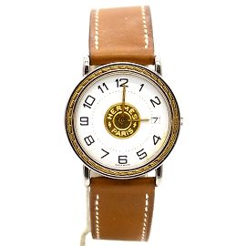 Relógio Sellier da Hermès. Dourado