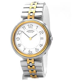 Montre Hermès, modèle "Profile". Doré