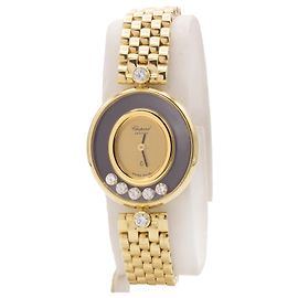Reloj Chopard, colección Happy Diamonds. Dorado