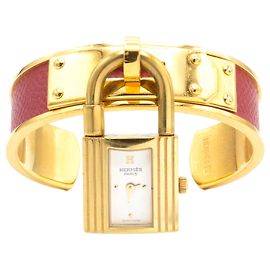 Montre Kelly de Hermès. Doré