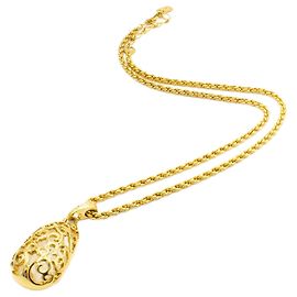 Colar Yves Saint Laurent. Dourado
