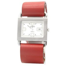 e um relógio Hermès original. Prata