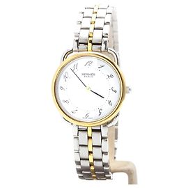 Relógio Hermès Arceau de aço e dourado Dourado