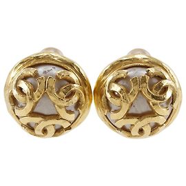 Orecchini Triple Coco Mark di Chanel D'oro