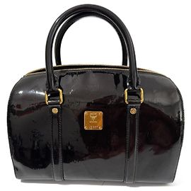 Borsa Boston MCM in pelle verniciata nera e oro Nero Gold hardware