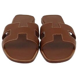 Hermès Hermes Gold Oran Sandals Golden