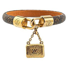 Bracelet en toile Monogram Louis Vuitton avec fermoir à torsion marron or Marron
