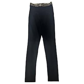 Leggings neri Greca di Versace Nero D'oro