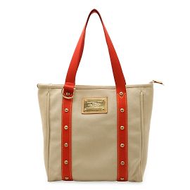 Borsa Tote MM Antigua di Louis Vuitton Rosso Beige