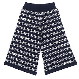 Calças largas de malha com padrão de corrente e fecho de língua COCO da Chanel Azul