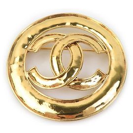 Broche de metal dourado Chanel Coco Mark Dourado