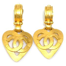 Ohrringe aus goldfarbenem Metall mit Coco Chanel Herzmarke Golden