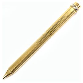 Penna a sfera in oro Trinity di Cartier D'oro