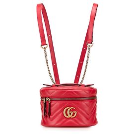 Runder Rucksack aus gestepptem Leder GG Marmont Mini in Rot von Gucci Rot