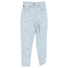 Jeans a vita alta con logo Versace in cotone blu Blu Blu chiaro