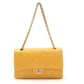 Bolso de hombro de cuero acolchado Chanel 25 con cadena Amarillo