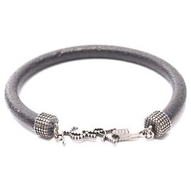 Bracciale OPIUM in pelle e acciaio inossidabile Yves Saint Laurent Nero