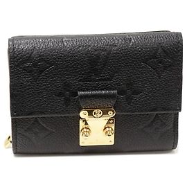 Portafoglio bi-fold con zip Louis Vuitton Monogram Empreinte Metis M80880 Nero