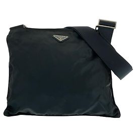 Bolso cruzado de nylon tessuto con logo triangular Prada Negro