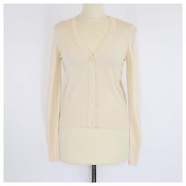 Alaïa Top cropped de lã tricotado com mangas longas e botões creme Alaia Cru
