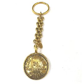 Porte-clés charm de sac vintage Chanel 31 Rue Cambon Doré