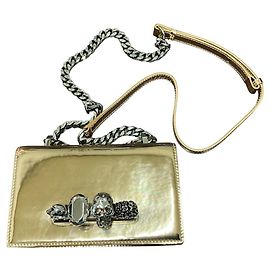 Bolsa Alexander McQueen em couro metálico dourado com knuckle prata Dourado