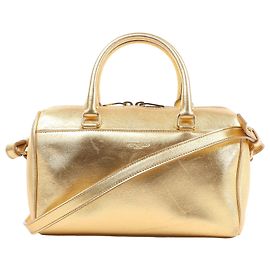 Bolsa Baby Duffle de couro 2Way da Saint Laurent Paris em ouro 330958 Bege