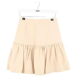 Miu Miu Mini jupe beige Beige
