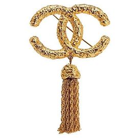 Broche Chanel CC Logo avec Pompon Dorée Bijouterie dorée
