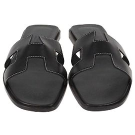 Sandali Oran in pelle nera Hermès Nero