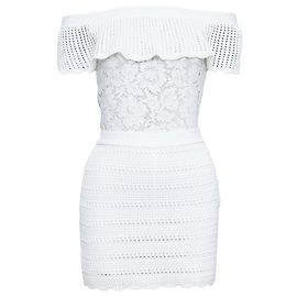 Valentino Garavani Combinaison blanche en dentelle Valentino à épaules dénudées Blanc