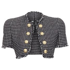 Giacca cropped in tweed bianco e nero con bottoni a testa di leone Balmain Nero