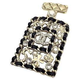 Chanel Brooch with Bottle Motif Black Golden