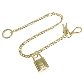 Chaveiro Charm Miu Miu Dourado