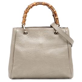 Bolsa shopper pequena em couro dourado Gucci com bambu Dourado