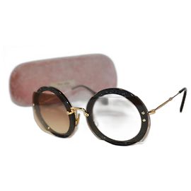 Miu Miu sunglasses Black Golden