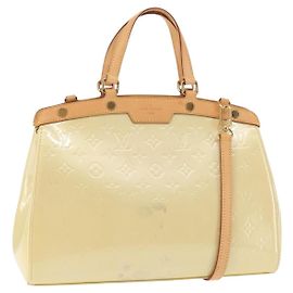 Bolsa Brea Monogram Vernis MM Louis Vuitton Bege