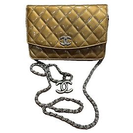 Portefeuille Chanel sur chaîne Doré